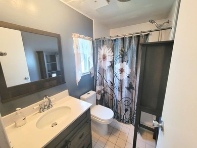 The property features a New roof and tile flooring throughout - photo 27