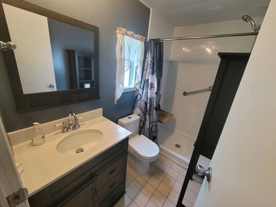 The property features a New roof and tile flooring throughout - photo 29