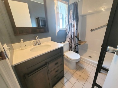The property features a New roof and tile flooring throughout - photo 30