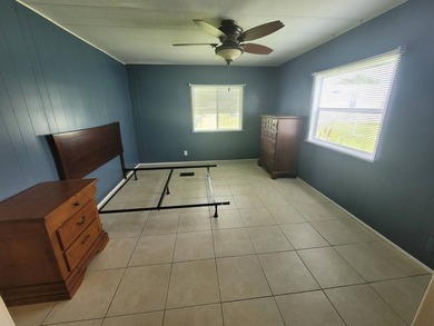 The property features a New roof and tile flooring throughout - photo 33