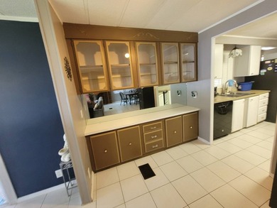 The property features a New roof and tile flooring throughout - photo 35