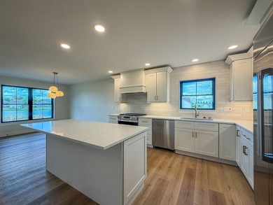 Experience luxury waterfront living in this stunning new - photo 11