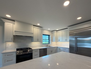Experience luxury waterfront living in this stunning new - photo 13