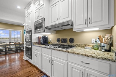 Waterfront living at its best! This striking brick 3-level home - photo 14