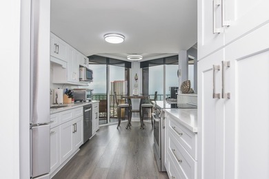 A truly stunning oceanfront gem! Fully remodeled in 2024, this - photo 15
