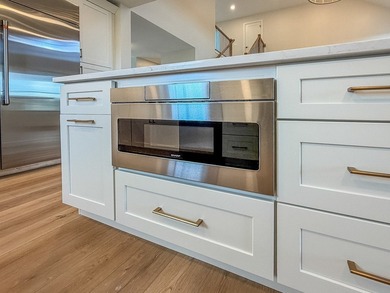 Experience luxury waterfront living in this stunning new - photo 17