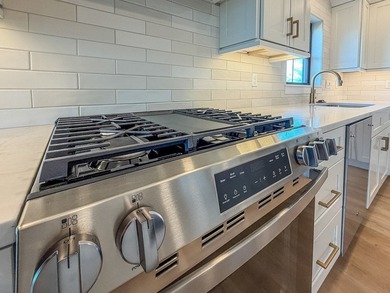 Experience luxury waterfront living in this stunning new - photo 18
