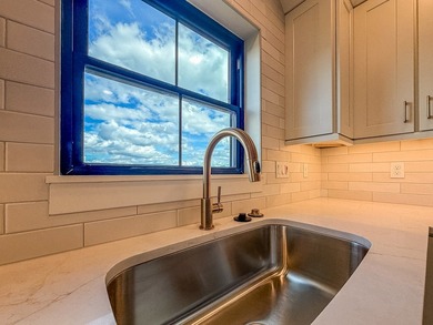 Experience luxury waterfront living in this stunning new - photo 19