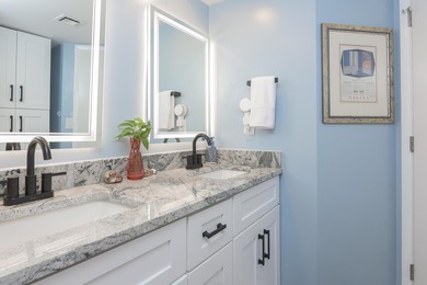 A truly stunning oceanfront gem! Fully remodeled in 2024, this - photo 29