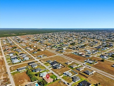Welcome to 2512 NW 8th Pl, Cape Coral, FL 33993. HUGE PRICE - photo 11