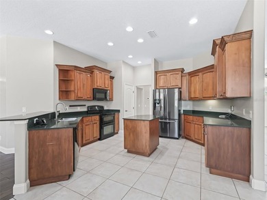 NOW OFFERED UNDER $1M~LOVELY HOME IN PRIVATE GATED LAKE WEIR - photo 42