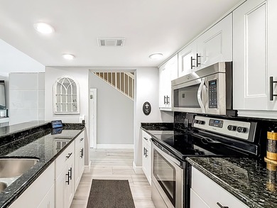 STUNNING WATERFRONT VILLA - COMPLETELY MOVE IN READY WITH - photo 13