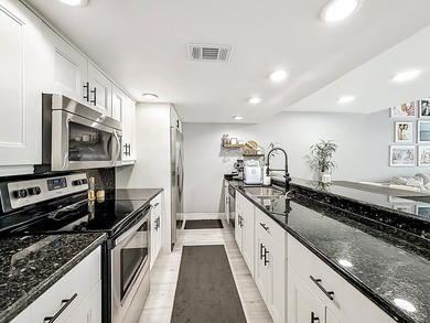 STUNNING WATERFRONT VILLA - COMPLETELY MOVE IN READY WITH - photo 14