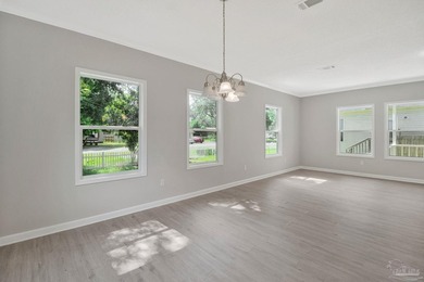 Completely renovated and move-in ready. This 3-bedroom, 2-bath - photo 12