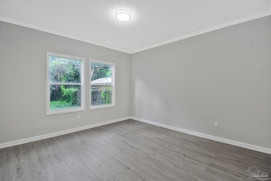 Completely renovated and move-in ready. This 3-bedroom, 2-bath - photo 18