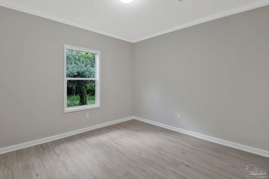 Completely renovated and move-in ready. This 3-bedroom, 2-bath - photo 26