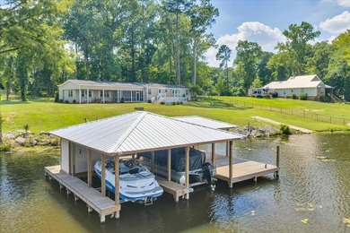 HUGE Waterfront Lot & home with guest cottage on Lake - photo 1
