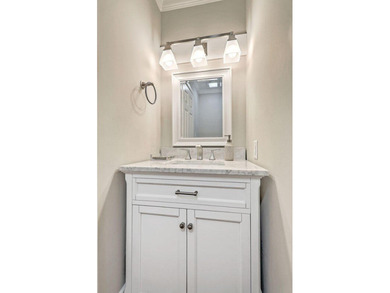 Move-in ready, tastefully updated 2-story, top floor unit in the