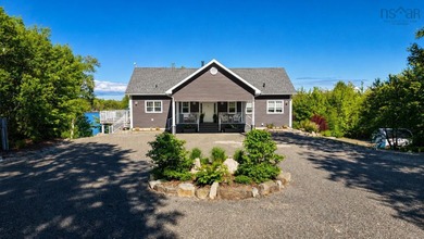Welcome to an extraordinary turnkey waterfront retreat, where - photo 11