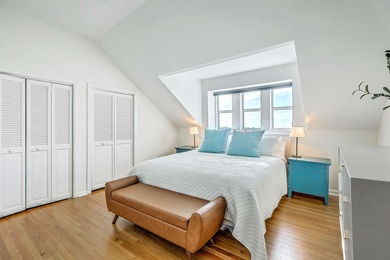 Move-in ready, tastefully updated 2-story, top floor unit in the