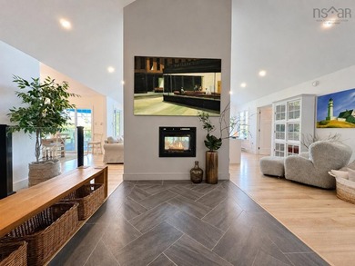 Welcome to an extraordinary turnkey waterfront retreat, where - photo 13