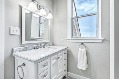 Move-in ready, tastefully updated 2-story, top floor unit in the