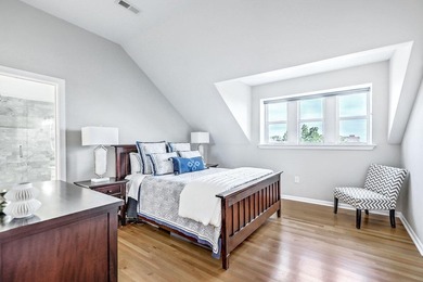 Move-in ready, tastefully updated 2-story, top floor unit in the