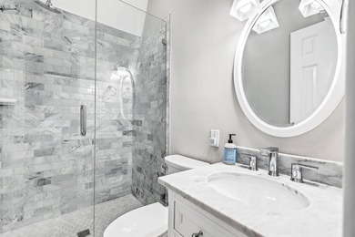 Move-in ready, tastefully updated 2-story, top floor unit in the