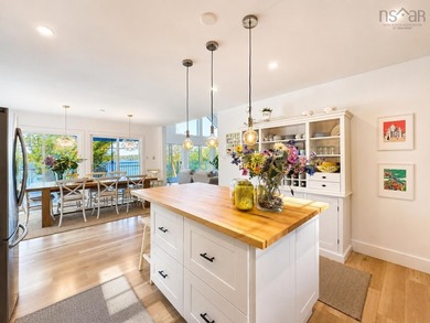 Welcome to an extraordinary turnkey waterfront retreat, where - photo 19