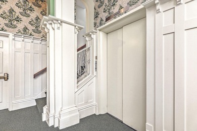 Move-in ready, tastefully updated 2-story, top floor unit in the