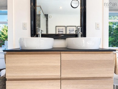 Welcome to an extraordinary turnkey waterfront retreat, where - photo 28
