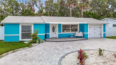 Live the Florida lifestyle in the highly sought-after waterfront - photo 1