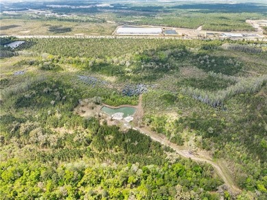 Tucked away yet just minutes from town, this 186-acre private - photo 1