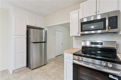 Completely remodeled and truly move-in ready-this home feels - photo 6