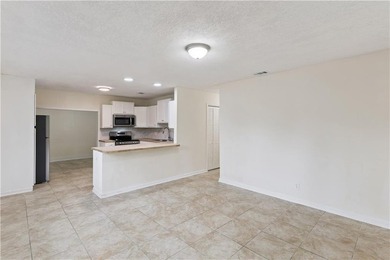 Completely remodeled and truly move-in ready-this home feels - photo 9