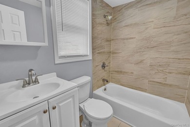 Location, Location, Location! This updated 4 bedroom, 3 bath - photo 17
