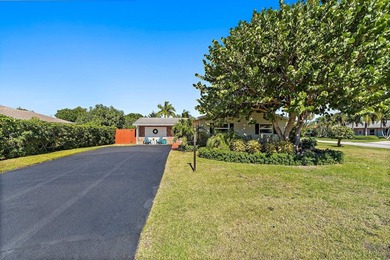 Positioned on an oversized corner lot in Lake Clarke Shores - photo 7