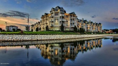 Beautiful Waterfront Condo overlooking channel to Lake Michigan! - Lake Condo For Sale in Ludington, Michigan