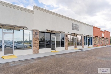 Reduced!!Great Commercial building with a total of 8 units which