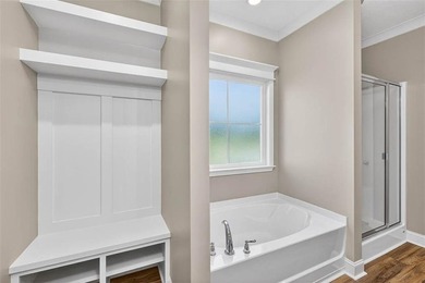 This beautiful, MOVE-IN READY new construction home sits on a - photo 10