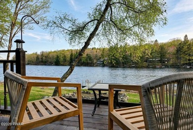 Splendor on the lake! A beautiful manicured, level lot on a - photo 1
