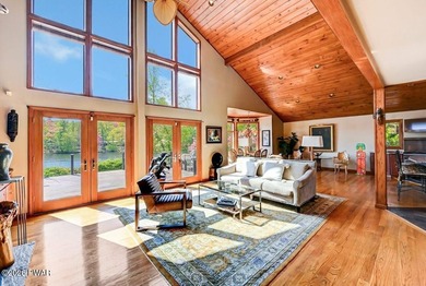 Splendor on the lake! A beautiful manicured, level lot on a - photo 9