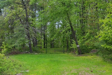 Set in a prime location with breathtaking views of Mousam Lake - photo 3
