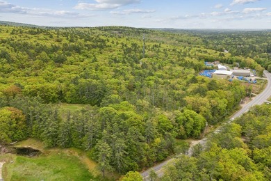 Set in a prime location with breathtaking views of Mousam Lake - photo 5