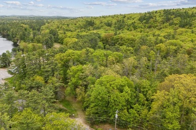 Set in a prime location with breathtaking views of Mousam Lake - photo 7