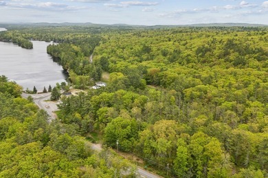 Set in a prime location with breathtaking views of Mousam Lake - photo 8