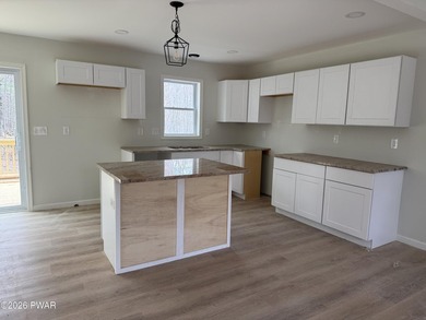 New construction with vaulted ceilings. Great starter or - photo 8