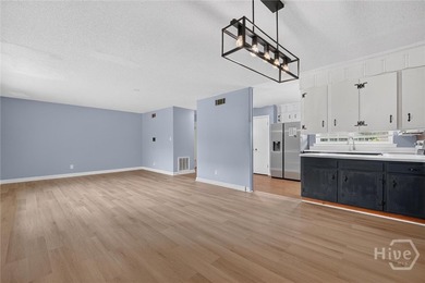 This well-maintained 3-bedroom, 2-bath brick ranch offers the - photo 4