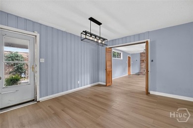 This well-maintained 3-bedroom, 2-bath brick ranch offers the - photo 8