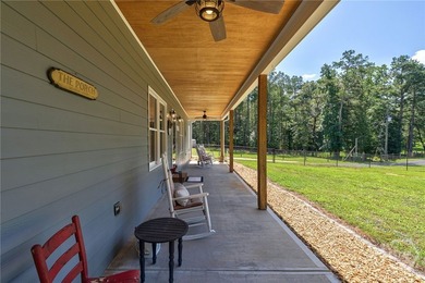 Set on 19.52 private acres, this thoughtfully designed 3-bedroom - photo 7